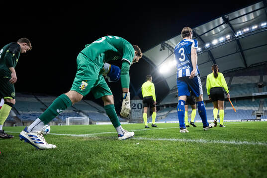 Goalkeeper Elis Bishesari and August Erlingmark of IFK
