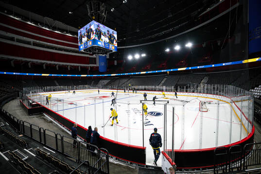 Players of the Swedish national ice hockey team enters the