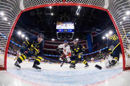 Henrik Tömmernes, Tim Heed and goaltender Linus