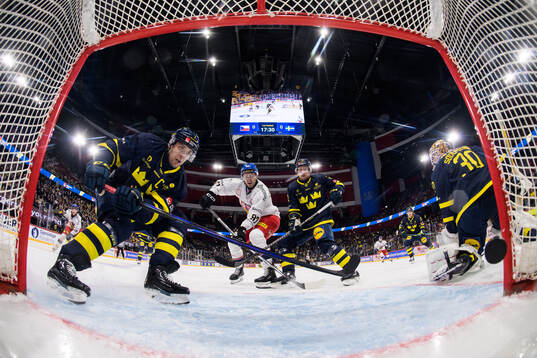 Henrik Tömmernes, Tim Heed and goaltender Linus