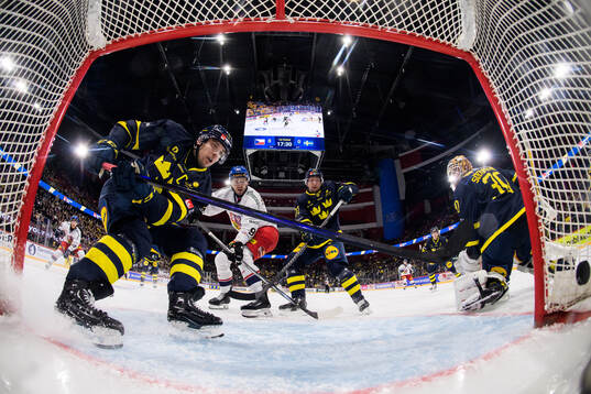 Henrik Tömmernes, Tim Heed and goaltender Linus