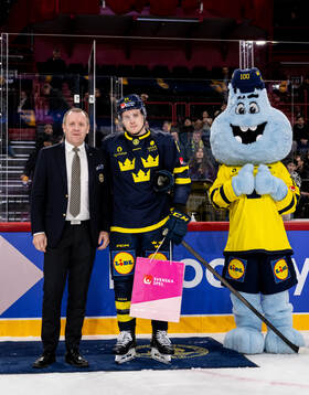 Sebastian Hartmann of Sweden is awarded player of the match