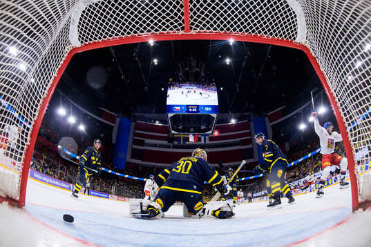 Goaltender Linus Söderström of Sweden lets in the 1-2