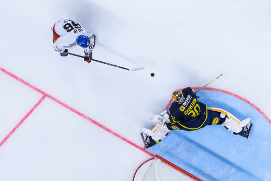 Matyas Filip of Czech Republic shoots against goaltender