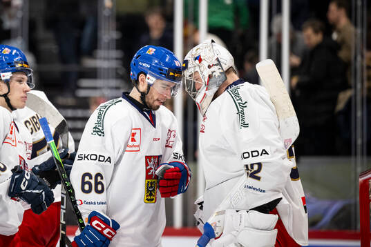 Matyas Filip and goaltender Josef Korenar of Czech Republic
