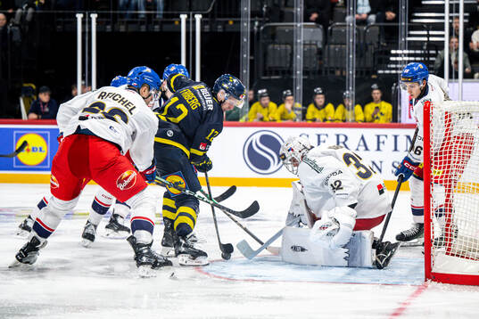 Max Friberg of Sweden and goaltender Josef Korenar of Czech