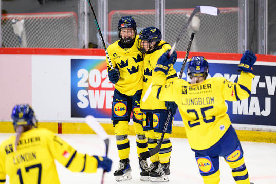 Hilda Svensson and Lisa Johansson of Sweden celebrate the