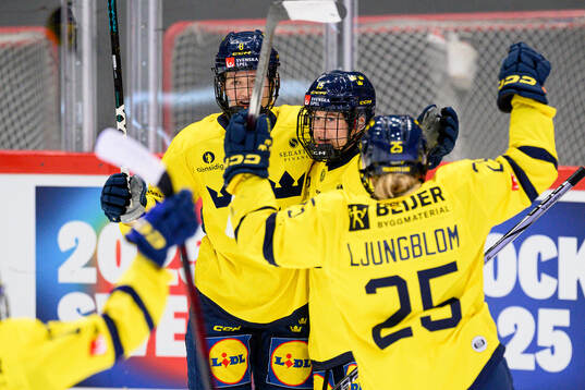 Hilda Svensson and Lisa Johansson of Sweden celebrate the