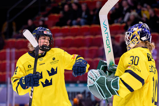 Ida Karlsson and goalkeeper Emma Söderberg of Sweden