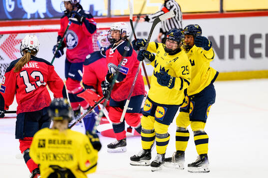Lina Ljungblom and Sofie Lundin of Sweden celebrate the 2-0