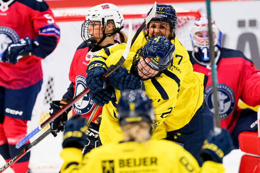 Lina Ljungblom and Sofie Lundin of Sweden celebrate the 2-0