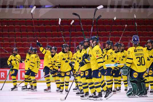 Players of Sweden celebrate