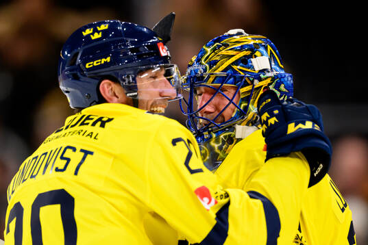 Joel Lundqvist and goaltender Henrik Lundqvist of Tre