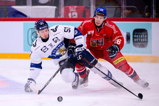 Markus Nurmi of Finland and Jiri Tichacek of Czech Republic
