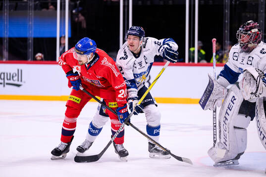 Michal Kunc of Czech Republic and Oskari Laaksonen of
