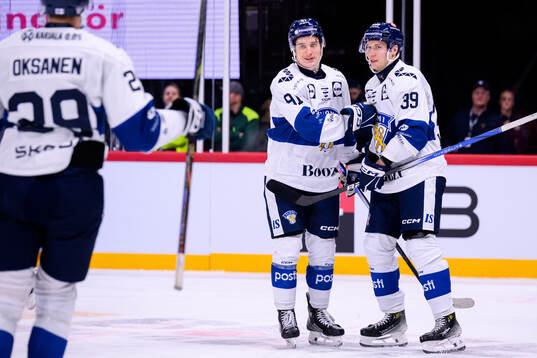 Oliver Kapanen and Sebastian Repo of Finland celebrate the