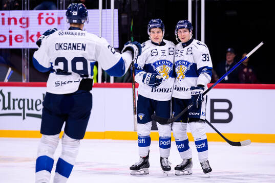 Oliver Kapanen and Sebastian Repo of Finland celebrate the