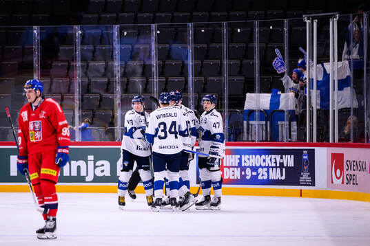 Mikael Ruohomaa and Sebastian Repo of Finland celebrate the