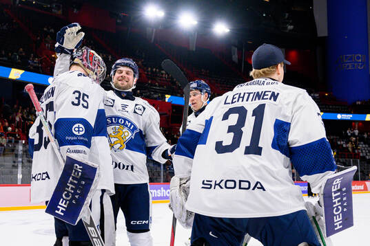 Goalkeeper Oskari Salminen of Finland celebrates with