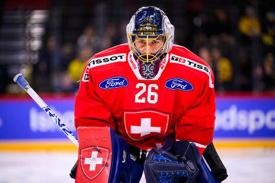 Goaltender Sandro Aeschlimann of Switzerland