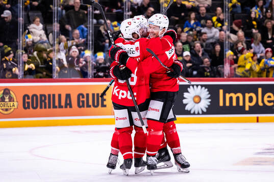 Players of Switzerland celebrate