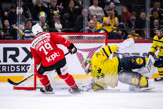 Calvin Thurkauf of Switzerland scores the 1-2 goal behind