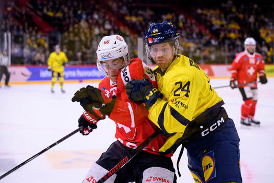 Tim Berni of Switzerland and Oscar Lindberg of Sweden