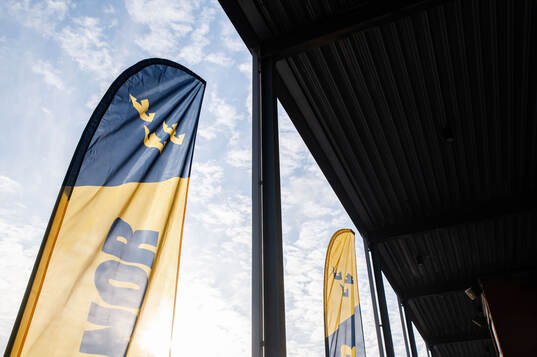 Flags of the Swedish crowns outside Monitor ERP Arena