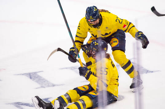 Jenna Raunio and Hanna Thuvik of Sweden celebrate