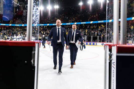 Assistant coach Nicklas Grossmann and Gereon Dahlgren of