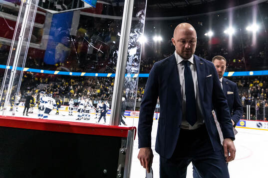 Assistant coach Nicklas Grossmann of Sweden looks dejected