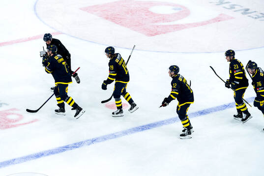 Players of Sweden celebrate