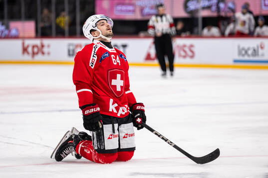 Marco Muller of Switzerland looks dejected