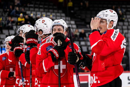 Players of Switzerland look dejected