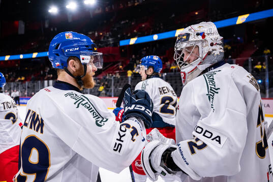 Oscar Flynn and Josef Korenar of Czech Republic celebrate