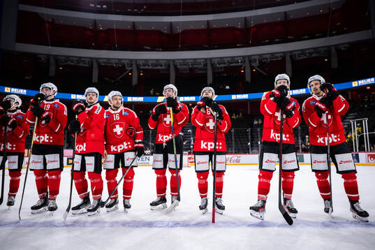 Players of of Switzerland look dejected