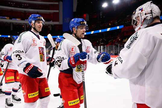 Ronald Knot and Radan Lenc celebrate with Goaltender Josef