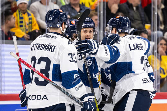 Eemil Erholtz of Finland celebrates
