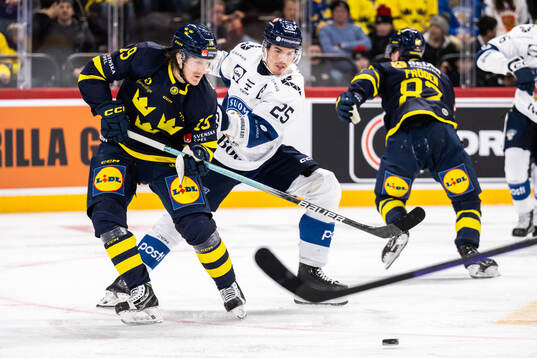 Marcus Sörensen of Sweden and Niclas Almari of Finland