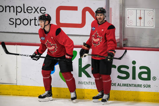 Nathan MacKinnon and Sidney Crosby of Canada at a practice