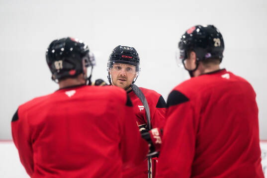 Sidney Crosby, Sam Reinhart and Nathan MacKinnon of Canada