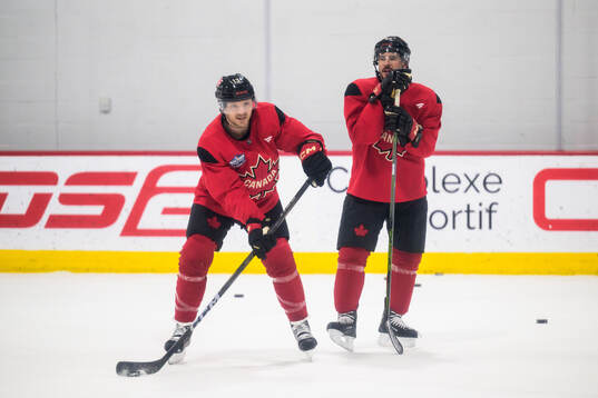 Sam Reinhart and Sidney Crosby of Canada at a practice
