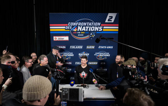 Sidney Crosby of Canada is being interviewed by media