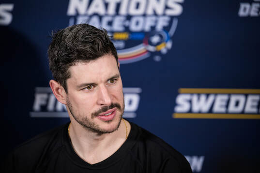 Sidney Crosby of Canada is being interviewed by media