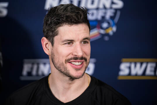 Sidney Crosby of Canada is being interviewed by media