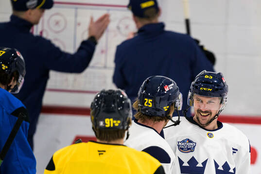 Jonas Brodin and Erik Karlsson of Sweden at a practice