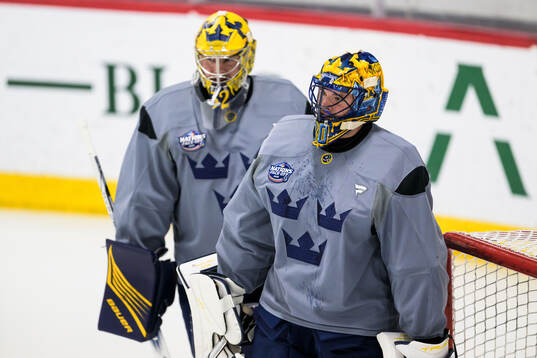 Goaltender Filip Gustavsson and goaltender Samuel Ersson of