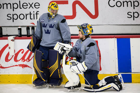 Goalkeeper Filip Gustavsson and goalkeeper Samuel Ersson of