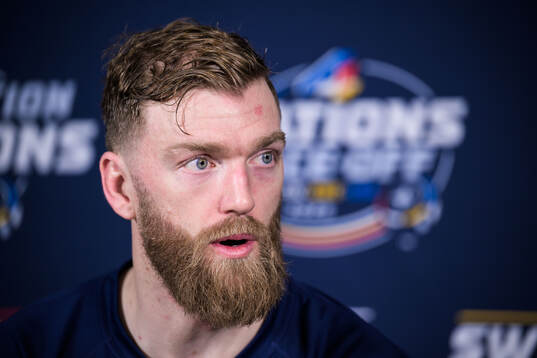 Mattias Ekholm of Sweden being interviewed by media