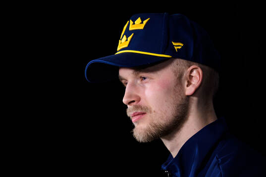 Elias Pettersson of Sweden being interviewed by media